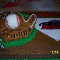 Baseball Signing Party This cake was made for a Highschool Baseball signing party it is buttercream icing with fondant accents and color flow decals.