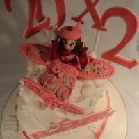 Jet-Settling Babe Into Pink Made this one for a friend. She's always flying off here and there... and loves pink! Decoration is using fondant/gumpaste and royal...