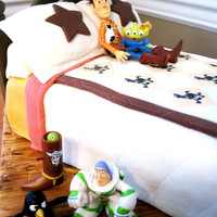 Andy's Bedroom This double chocolate cake was filled with chocolate frosting and covered in butter cream. Homemade marshmallow fondant was used to create...