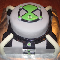 Ben 10 Omnitrix Watch Face This birthday cake is an edible replica of a Ben 10 Omnitrix watch face. It is covered in home made marshmallow fondant. When it was...