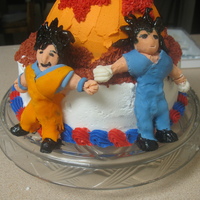 Dragon Ball Z Cake butter cream icing covers 8 in cake and ball, gum paste figures. First time I have used gum paste. Need more work but did not think I did...