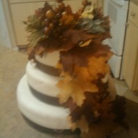 Fall Wedding Cake This was a small wedding cake for fall wedding. Spice Cake with Cream Cheese Buttercream filling and covered in mmf and gumpaste leaves....