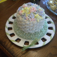 Easter Flower Basket Buttercream flowers on vanilla cake. Filled with strawberry buttercream.