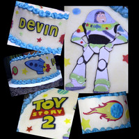 Buzz Lighyear This cake was a joint effort, My sister made and frosted the cake and I did the fondant decorations. It was so fun to work on this together...