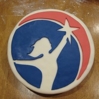 Ahg Kick-Off Cake 1 Yellow cake with fondant icing. Sliced the cake in half at an angle, then twisted the top around 180 degrees to get the tilt. Originally,...