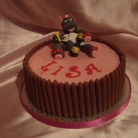 Girly Birthday Cake hippo spa cake girl hippo enjoying a relaxing time drinking champagne... chocolate fingers around the edge of chocolate fudge cake