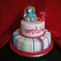 My Nieces 3Rd Birthday Cake this is my first attempt at a tiered cake.. choc fudge on top and a spounge on the bottom