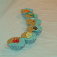 Seaside Cupcakes Made for my son's class on the last day of term. Vanilla cupcake & butter cream, digestive biscuit sand and fondant/gum paste...