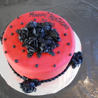 Red Fondant Birthday Cake Red fondant birthday cake with black roses.