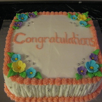 Congratulations Cake Sponge cake covered with Butter cream and Iced flowers