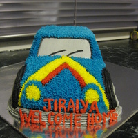 Car Cake Sponge cake filled with butter cream. It's a welcome home cake for my beautiful new baby Nephew.