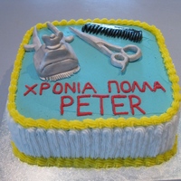 Hairdresser Cake Vanilla sponge cake covered with Butter Cream. Accessories made from fondant.