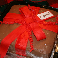 Package This was a cake for a celebration around Christmas, although it wasn't exactly a Christmas party. The bow and ribbons were out of...