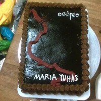 You Bet It's A Twilight Themed Cake... Yeah. The "Eclipse" cover on a 1/4 sheet cake. I didn't have a tip any wider for the ribbon, which is sad. But there you...