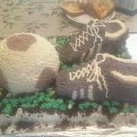 Soccer Cake "field" is strawberry cake, shoes are chocolate cake and ball is yellow cake. Shoes are carved out and it was my first time. I...