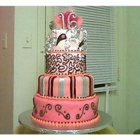 Sweet 16 Cake Covered in fondant with some buttercream accents. Top two tiers are dummies, first try at those for me.