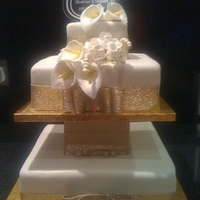 Ivory & Gold Wedding Cake I was given a picture to copy off I think I did a good job.