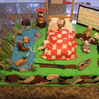 The Critters Take Over This cake was for a young man's graduation and birthday combined. I was told he likes to sleep in his bed, hunt and fish, play video...