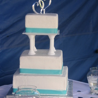 1St Stacked Square Wedding 1st square stacked wedding cake! Bride wanted simple with ribbon color to match the bridesmaids dresses. Found that simple wasn't that...