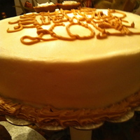 Birthday Cake Pound cake with Almond buttercream topping written with milk chocolate