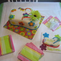 Flip Flop Cake 2 layer marble cake shaped out of a 13x9 pan.buttercream and MMF. MMF flowers.