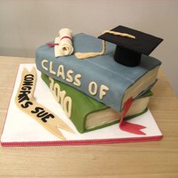 Stacked Books Graduation Cake Made for my sister who graduated today. It was a bit rushed but turned out ok in the end and she was thrilled with it.