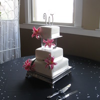 Square Cake With Glass Seperator square fondant wedding cake with glass seperator.