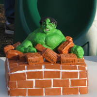 Incredible Hulk Birthday Cake This was made for our son's 3rd birthday. My husband sculpted the Hulk out of rice cereal treats and then covered it with candy clay....