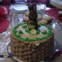 Easter Basket Cake Butter cake with Cream Cheese frosting. Chocolate bunny and candy eggs.