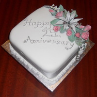 25Th Anniversary this cake was kinda thrown together, the flowers were all left over from a course.