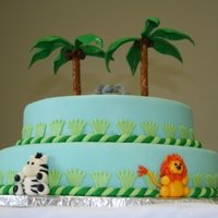 Baby Animal Cake my first experience with fondant! should have used double layers on the tiers, but didn't need that much cake!