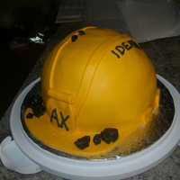 Hard Hat Cake This is vanilla cake covered in marshmallow fondant (it was a hot day and it started to get "holey") with licorice "coal&...