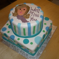 Going Away Cake Marshmallow covered yellow and chocolate cakes, marshmallow fondant for everything else except the hair, scarf, words.