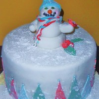 Snowman Mmf with powdered sugar and sparkling sugar snow, gumpaste snowman