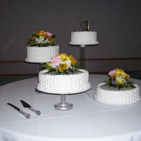 Basket Weave This was actually for a 50th anniversary party. White cake, white BC, fresh flowers.