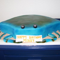 Crab Cake White cake with BC icing, covered with Fondant. The legs and pinchers are fondant as well.
