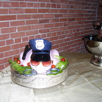 Sgt. Pigg This was a groom's cake for a police officer. He wanted a roasted pig in uniform, and he got it. Red velvet cake, cream cheese icing,...