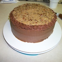 First German Chocolate German chocolate cake with pecan coconut frosting. The frosting was actually easier than I thought it would be.