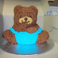 Baby Bear Boy This was my first 3D cake. Combined a box mix with a homemade pound cake batter and it was great.