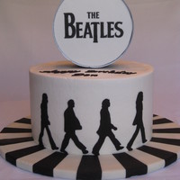 The Beatles - Abbey Road Birthday cake for a fan of The Beatles.Buttercream, 10" round, 3 layers (6" high). Fondant Beatles silhouettes. Fondant covered...