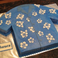 Company Luau Cake Men's Hawaiian shirt made for my husband's company BBQ. The theme of the party was a Hawaiian Luau. White cake with buttercream....