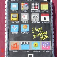 Ipod 9x13 cake decorated with fondant decorations representing Ipod Touch icons.