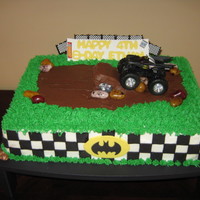 Batman Monster Truck Cake Butter cake with buttercream and fondant accents. Mother placed the "smashed" cars at the party.
