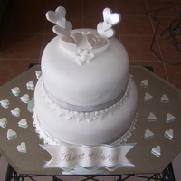 Mini Wedding Cake Vanilla/almond buttercream-filled cake. RF covered and accented.