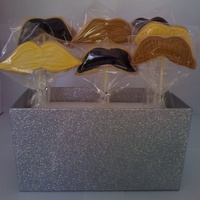 Mustache Cookies "blond" and brown mustaches made with royal icing. black mustache made with royal icing and black sanding sugar on top