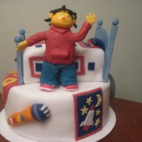 Sid The Science Kid Sid and Dr. Beaks from the PBS show "Sid the science kid". 10" 3 layer chocolate cake with chocolate buttercream frosting.