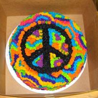 Peace/tye Dye Cake I had alot of fun making this cake. The icing is white chocolate butter cream and the cake in vanilla.