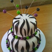Zebra Print Zebra print cake with MMF, vanilla butter cream with chocolate cake.