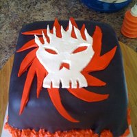 Flames And Skull Cake Flames and skull cake. Not one of my favorite to make but I had fun. The icing is chocolate butter cream and the cake is chocolate.