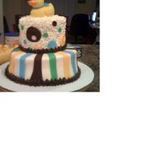 First Baby Shower Cake This is my first baby shower cake. This is the first cake I have made that I have not been pleased with. This cake was a headache for me to...